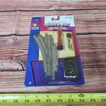 Life Like Trains Power Loc Scale Left Hand Switch Track Gray Base Sealed. Fixed Price $18.00.