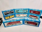 Life-like Ho Scale Campbell's Locomotive Engine + 7 Cars Track Transformer. Fixed Price $79.99.