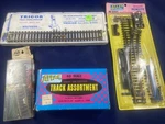Lot: Atlas #51 Ho Right Remote Snap Switch, Track Assortment, Trigor And More!. Fixed Price $24.98.