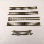 Lot 5 Lionel 0909 Straight Track Section With 1 Curve 0984. Fixed Price $17.95.