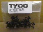 Track Clips By Tyco Ho Scale Factory Original Item # 4-B7922 New, Nice, Handy. Fixed Price $15.99.