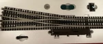 Atlas Gauge #6025, #5 Turnout Right Hand Switch, 3 Rail. Fixed Price $125.00.