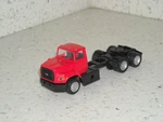 Herpa Ho Scale Ford L-9000 Aeromax Day Cab Tractor, Red. Fixed Price $14.99.