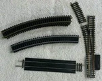 Tyco Ho Scale 9 Sections Radius Curve Rerailer Left Switch 1/3. Fixed Price $14.99.
