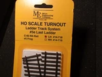 Micro- Engineering #14-718 Ho Ladder Track System Turnout Lh #5E Code 83. Fixed Price $44.95.