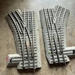 (2) Lionel Fastrack O-36 Left & Right Hand Manual W/switch Signal O-gauge. Fixed Price $60.00.