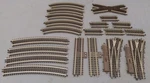 Atlas Assorted Curve, Straight, & Powered Track #6043,6062,6071,6051,6010 20. Fixed Price $145.59.