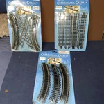 New Cobblestone Corners Train Track Lot 21 Piece, Christmas Village Read. Fixed Price $9.99.