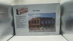 Scale Walthers Cornerstone Car Shop Building Kit New Box. Fixed Price $50.00.