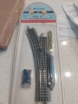 Model Power Roadbed Track Ho Nickel Remote Switch Left 4561 - New & Sealed. Fixed Price $25.00.