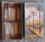 Atlas #775-89 Scale 12 Piece Telephone Poles With Transformers And Boxes. Fixed Price $10.00.
