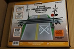 Menards "o" Gauge Crossing Gate With Lights. Fixed Price $64.95.