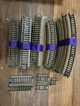 T-ho 52 Pc Marklin 5100/5106/HO Scale M-track Lot. Fixed Price $68.99.
