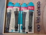 Four Peco N/s Switches + Motors ( ). Fixed Price $59.95.