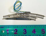 : Z Scale Marklin Mini-club 8567 Curved Right Turnout Track. Fixed Price $37.00.