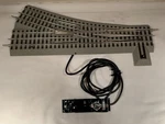 Lionel Fastrack Remote Command 0-60 Right Hand Switch 6-81950 Gauge O-60. Fixed Price $99.95.
