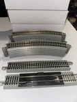 12 Bachmann Ho 9" Curve E-z Track 18"R 30O , Including Two Straight Pieces. Fixed Price $26.00.