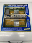 Ahm/lima #5602 Ho Scale Operating Crossing Gate Nib. Fixed Price $15.00.