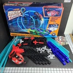 Lionel 7-20004 Mega Tracks Corkscrew Chaos Starter Set Red Car Pre-owned Open. Fixed Price $16.36.