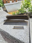 (19) Pieces Atlas 18"R Curved, 9" Straight & 1/3 Brass Snap Track. Fixed Price $16.95.