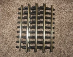 New Bright Holiday Express Straight Tracks 384-387 Series Polished Train. Fixed Price $39.95.