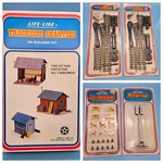 Ho Life Like 3 Train Model Buildings + 4 Accessories 2 Left Switch, Light, Cone. Fixed Price $40.00.
