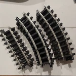 New Bright Gauge 12 Curved 4 Straight Track Lot Black/silver Plastic/metal. Fixed Price $60.00.
