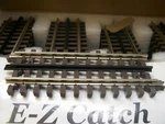 Brand New Atlas # 6053 ( 5-1/2" ) Solid Nickel Rail Straight Section Sold Each. Fixed Price $8.39.