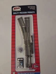 Atlas 546 Track Code 83, Nickel Silver Rail 22" Radius Left Hand Remote. Fixed Price $28.95.