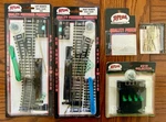 Atlas Ho Scale Right/left Remote, Selector, Track Joiners (#850, 851, 251). Fixed Price $99.99.