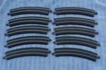 10 Pieces Of Genuine Bachmann Curved Black Ho Train Track E-z Sections. Fixed Price $15.00.