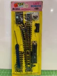 Vintage Atlas Ho Scale Left Remote Snap Switch #50-550 New Package. Fixed Price $17.00.