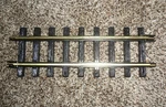 New Bright Holiday Express One Straight 384 Series Polished Train Tracks. Fixed Price $11.50.
