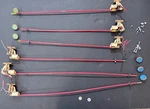 Six Built Bullfrog Turnout Machines With Control Rods. Fixed Price $85.00.
