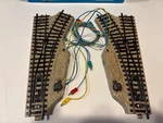Marklin 5117 Left & Right Turnouts - Ho Track (a). Fixed Price $25.00.
