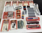 Huge Lot Of Hornby Railways Miniatures, Trains, Tracks, Quick Fits 31 Piece Set. Fixed Price $349.50.