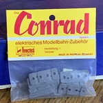Conrad Hartel Ho Trolley-traction Track Clips. Fixed Price $22.00.
