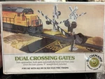 Bachmann #46220 Dual Crossing Gates, Ho Gauge, New Box, Unopened. Fixed Price $18.99.