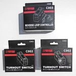 Rokuhan Z-gauge C002 Turnout Switches (2) & C003 Reverse Loop Controller, Nib's. Fixed Price $64.99.