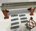 Lionel LNL649852 Af Fastrack Adapter To American Flyer Trestle Set # 26781. Fixed Price $16.00.