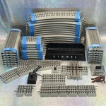 Lot Of 51 Pieces Lionel Fastrack Gauge. Fixed Price $269.99.