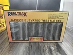 Mth Rail Kings 40-1113 Realtrax 24-PIECE Graduated Trestle System J.325. Fixed Price $38.24.